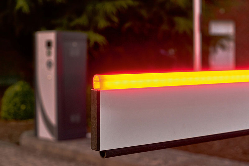Barrier boom with LED light strip